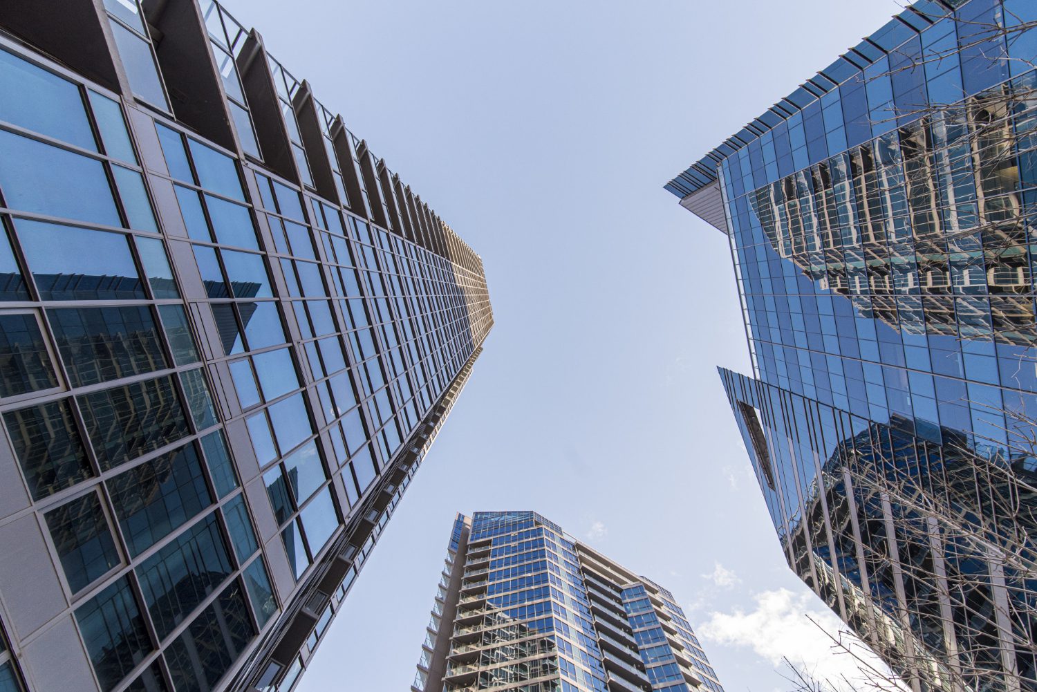 low angle shot blue high rise buildings