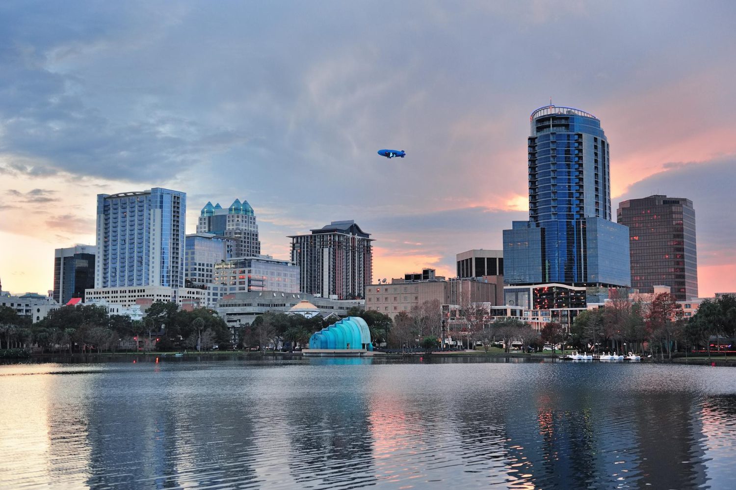 orlando lake eola sunset with urban architecture skyline colorful cloud 1